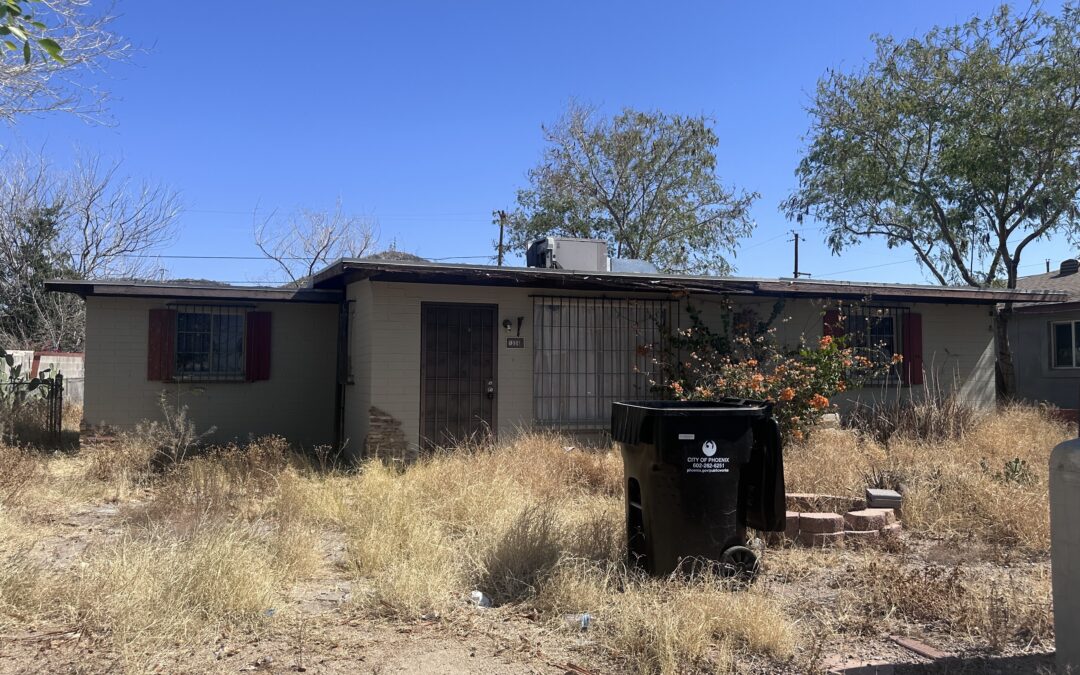 Actual inherited Phoenix house purchased by Shrubby with an overgrown dry yard and deferred exterior maintenance
