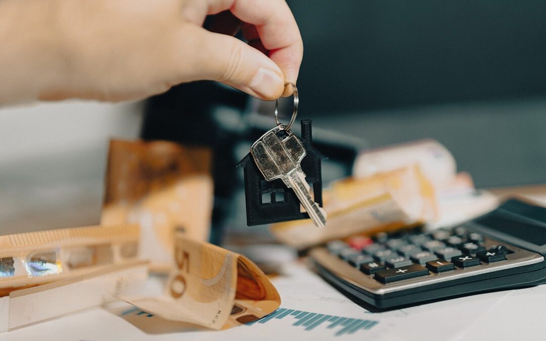 Home seller reviewing financing, paperwork and keys when comparing selling options