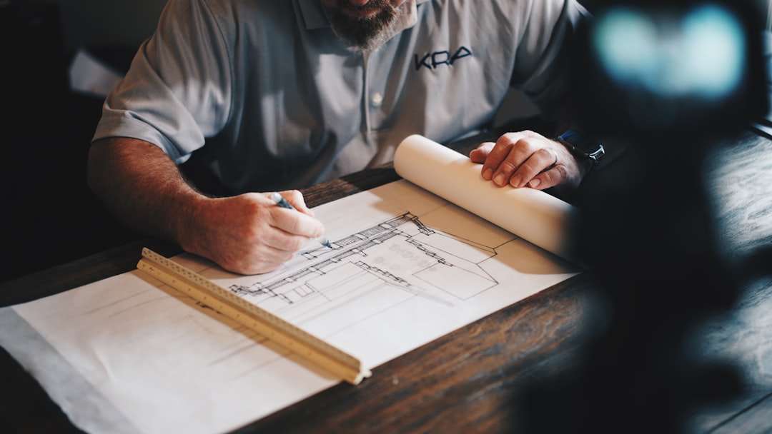 Architect reviewing construction plans for a home addition